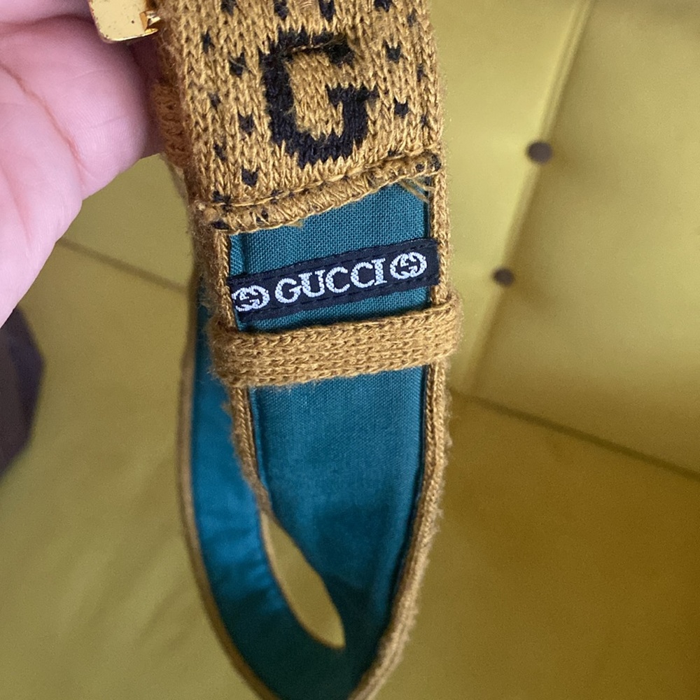 Authentic vintage Gucci belt yellow & black with green interior.